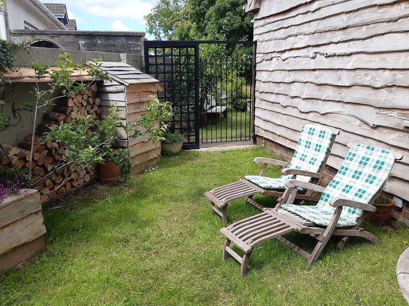 Your own private garden with wooden steamers, table and chairs at The Swallows, Bishopston. Your own private garden with wooden steamers, table and chairs at The Swallows, Bishopston.